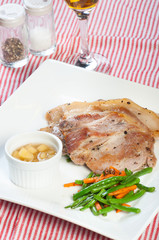 pork steak with apple sauce and french beans