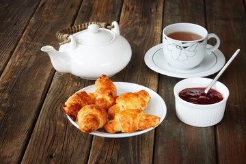 Breakfast with tea and homemade croissants