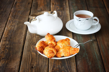 Breakfast with tea and homemade croissants