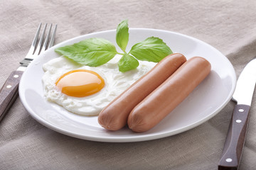 Sausages with fried egg
