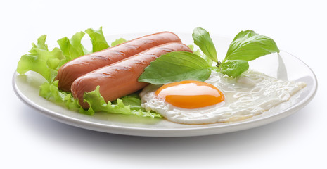 Roasted sausages and fried egg