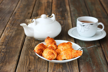 Breakfast with tea and homemade croissants