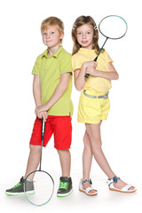 Children with badminton racket - 58663317
