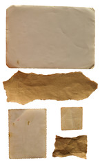 Collection of few diferent old paper pieces isolated on white