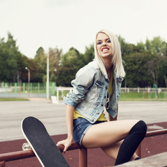 Beautiful happy student relaxing outdoor