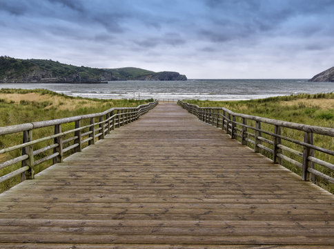 Wooden walkway to the sea
