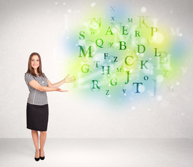 Business women with glowing letter concept