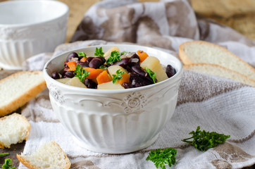 Bean stew with vegetables and meat