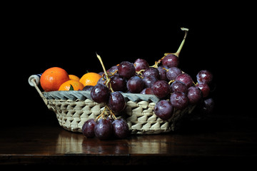 cesto di uva e mandarini  - autunno