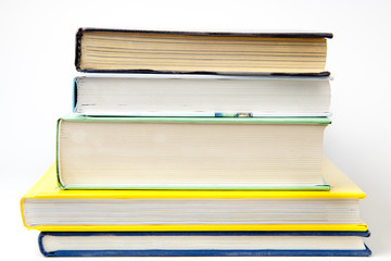 stack of books on white background