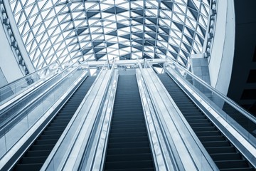 Moving escalator in the business center © Sved Oliver