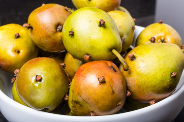 Spiced seckel pears being preserved