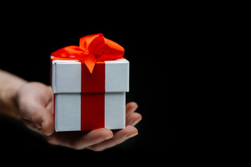 Hand with giftbox