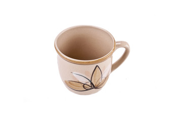 A pottery pitcher of milk on white background