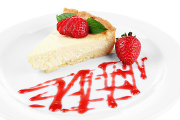 Slice of cheesecake with  strawberry and sauce