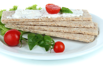 Fototapeta na wymiar Tasty crispbreads with vegetables, isolated on white