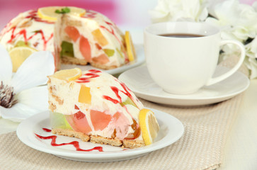Delicious jelly cake on table close-up