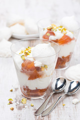 dessert with canned peaches, whipped cream and meringue