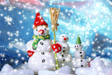 Beautiful snowmen and Christmas decor, on bright background