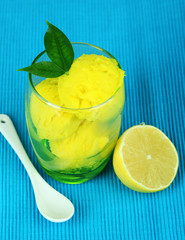 Delicious ice cream in glass on table close-up