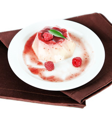 Panna Cotta with raspberry sauce, isolated on white