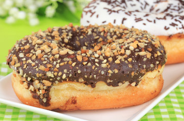 Sweet donuts on table close-up