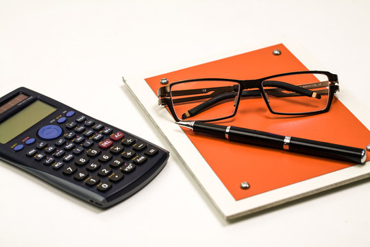 Blank notepad and accessories for secretary in the office, calcu