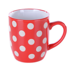 Red polka dot mug isolated on white