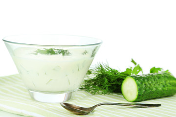 Cucumber yogurt in glass bowl,