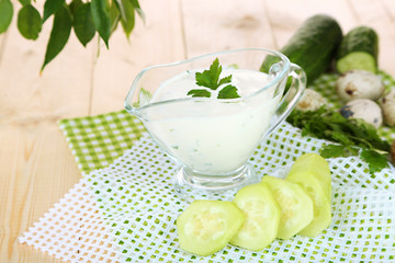 Cucumber yogurt in glass bowl,