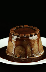 Yummy chocolate cake on black background