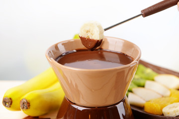 Chocolate fondue with fruits,