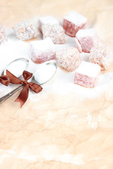 Tasty oriental sweets (Turkish delight) with powdered sugar,