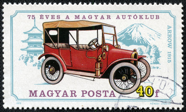stamp printed in Hungary shows vintage car