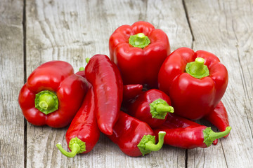 red peppers on wooden background