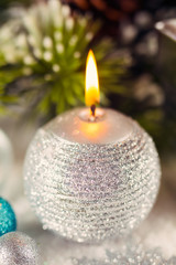 Obraz na płótnie Canvas Christmas candle close up
