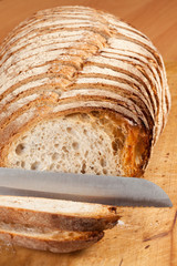 Sliced ​​bread on a wooden board