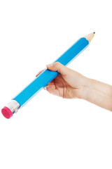 Woman's hand is holding big pencil.