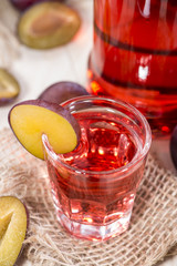 Glass with Plum Liqueur