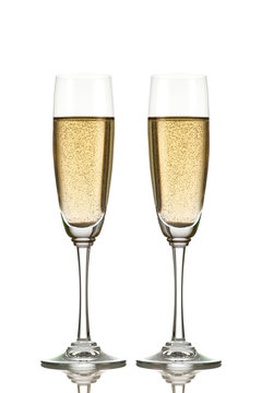 Two champagne glasses isolated on white