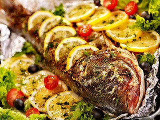 Grill fish at oven-tray .
