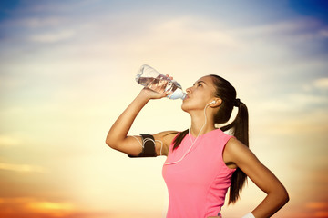 sporty girl  drinking water