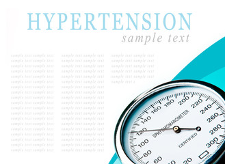 Sphygmomanometer on blue, reflective background