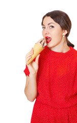 Pretty woman in red dress eating ice cream