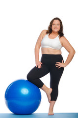 Fototapeta na wymiar Fat woman doing fitness