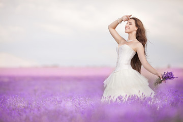 Bride in wedding day in lavender field