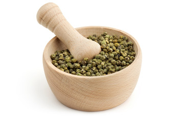 mortar and pestle with green peppercorns