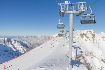 Fototapeta premium Chairlift in a ski resort. Sochi, Russia