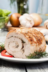 Meat roll stuffed with mushrooms