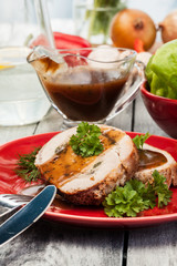 Slices of pork roast stuffed with mushrooms